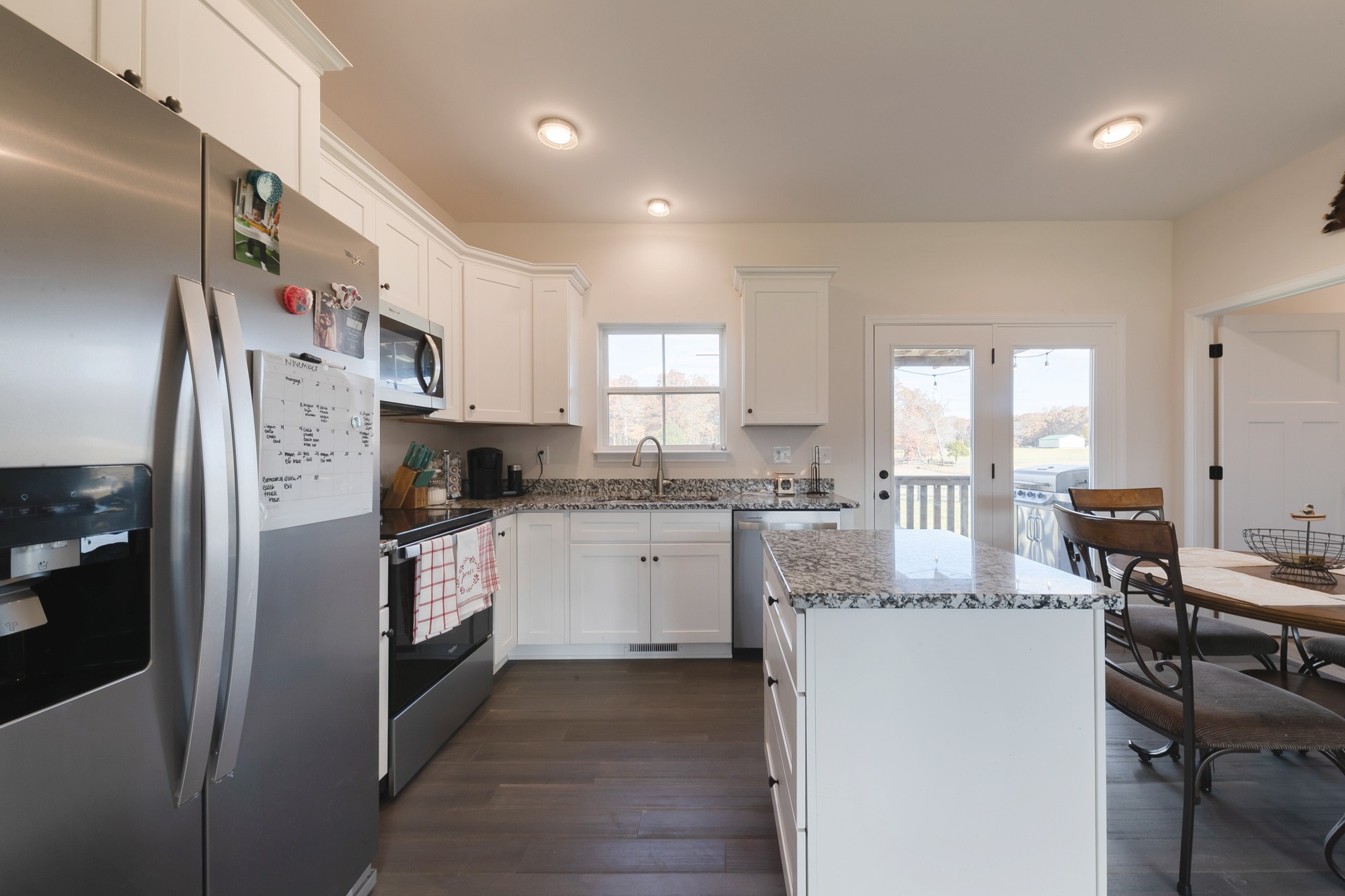 425 Pruett Road Dickson, TN 37055 - Photo 18 of 31 a kitchen with a refrigerator a stove a sink and a window