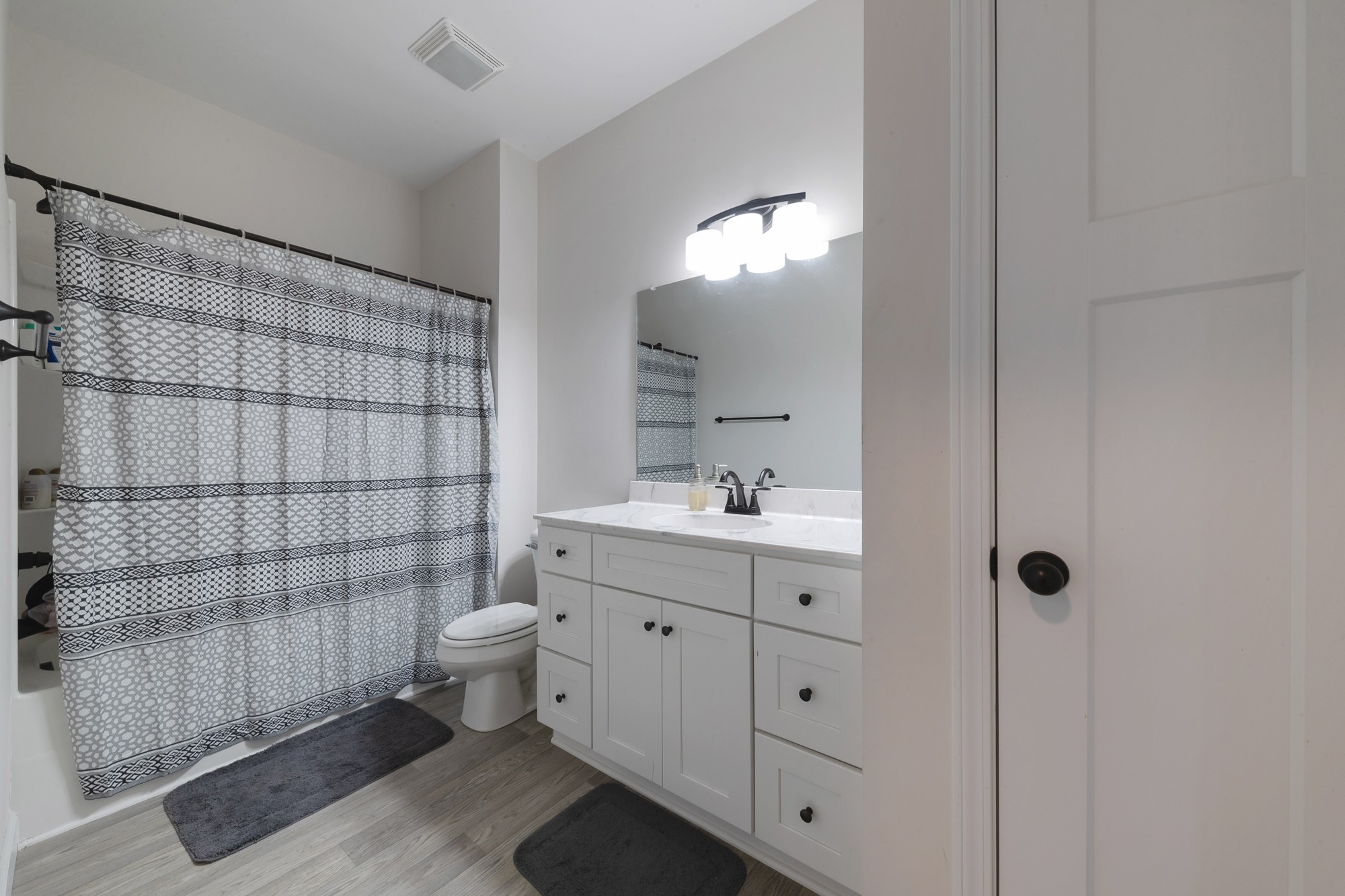 425 Pruett Road Dickson, TN 37055 - Photo 22 of 31 a bathroom with a double vanity sink toilet and shower