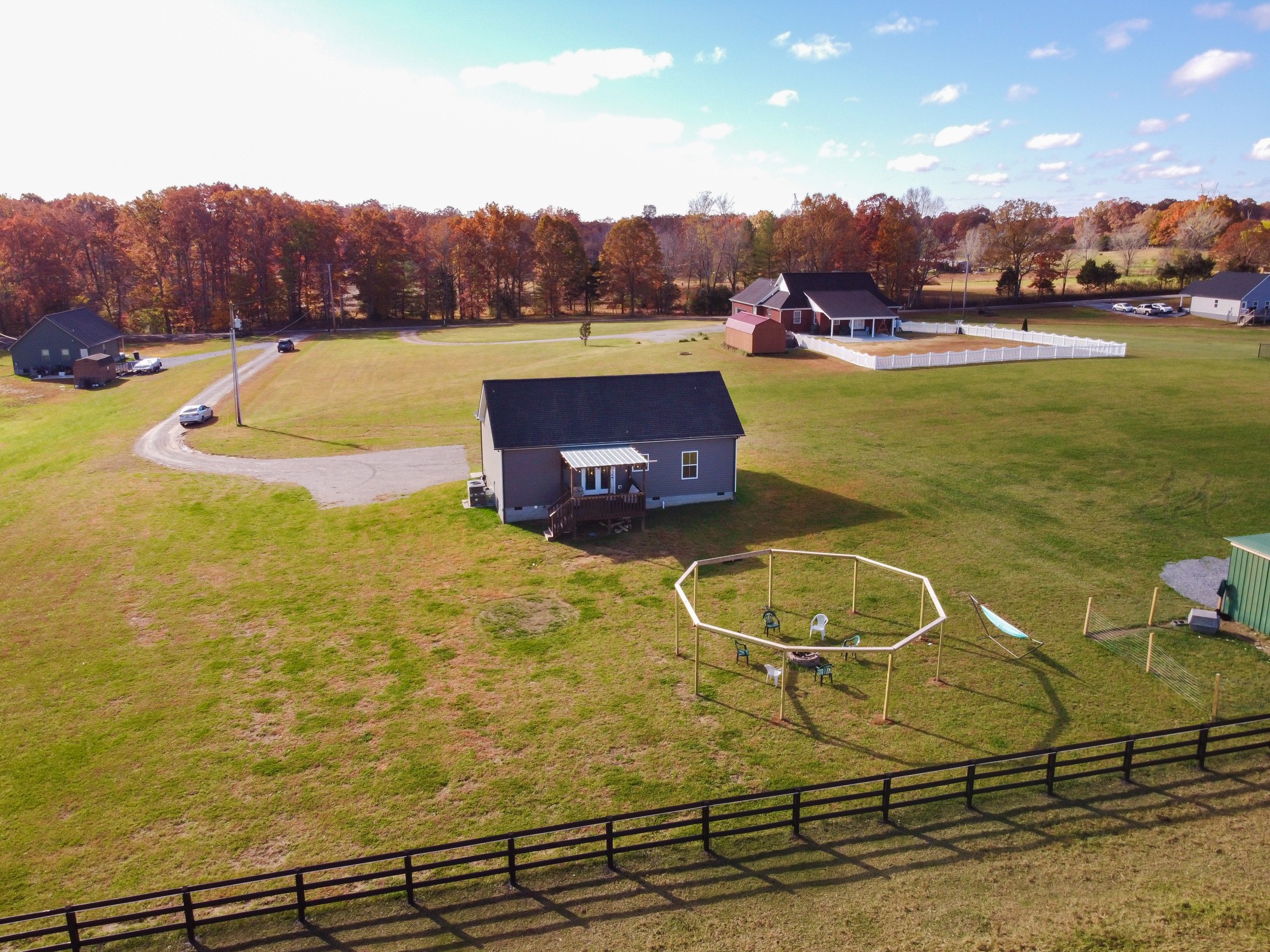 425 Pruett Road Dickson, TN 37055 - Photo 8 of 31 a view of a swimming pool with a table and chairs