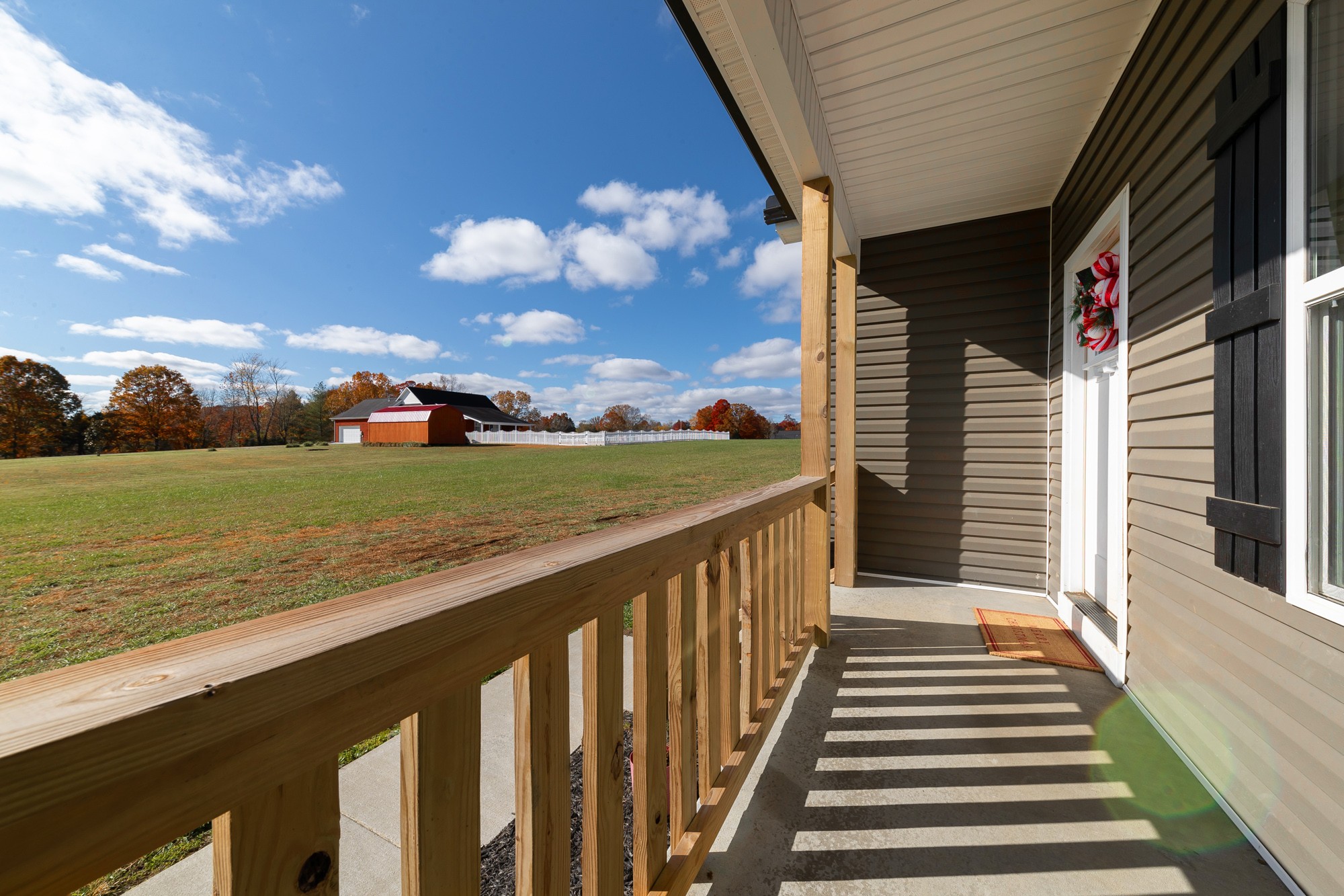 425 Pruett Road Dickson, TN 37055 - Photo 9 of 31 a view of a balcony with wooden floor