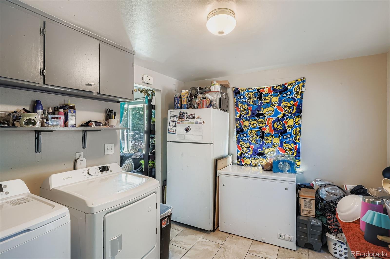 8805 West 46th Avenue Wheat Ridge, CO 80033 - Photo 16 of 25 a utility room with dryer and washer