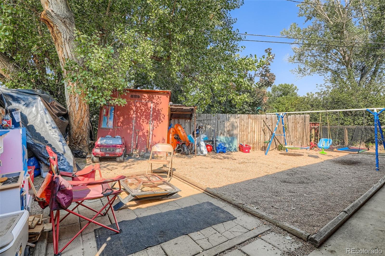 8805 West 46th Avenue Wheat Ridge, CO 80033 - Photo 21 of 25 an outdoor space with patio