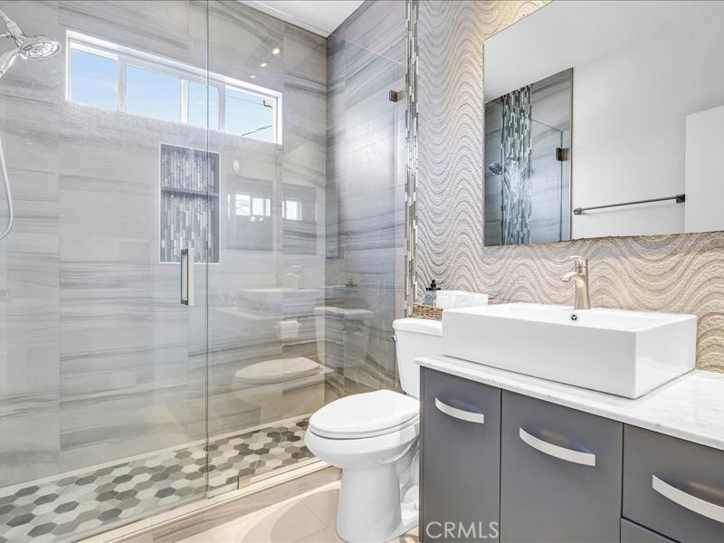 3405 South El Camino Real, Unit A San Clemente, CA 92672 - Photo 22 of 58 a bathroom with a sink toilet and shower