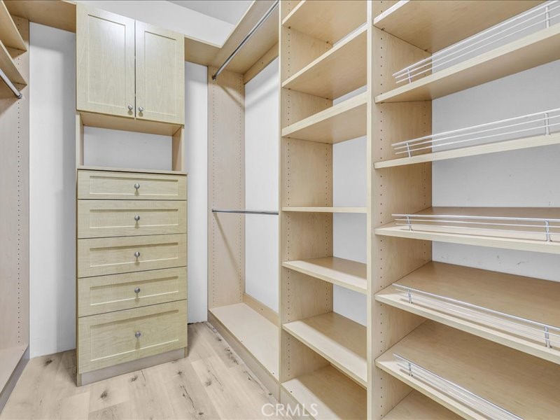 3405 South El Camino Real, Unit A San Clemente, CA 92672 - Photo 23 of 58 a view of walk in closet with empty racks