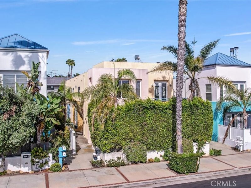 3405 South El Camino Real, Unit A San Clemente, CA 92672 - Photo 3 of 58 a front view of a house with a yard
