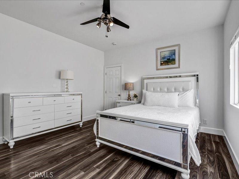 3405 South El Camino Real, Unit A San Clemente, CA 92672 - Photo 38 of 58 a bedroom with a bed and a dresser