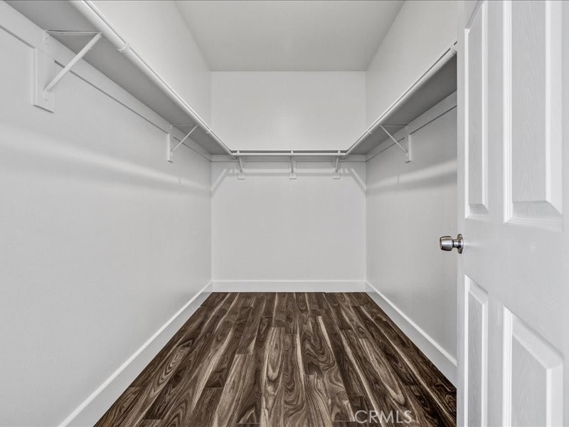 3405 South El Camino Real, Unit A San Clemente, CA 92672 - Photo 40 of 58 a view of a room with wooden floor
