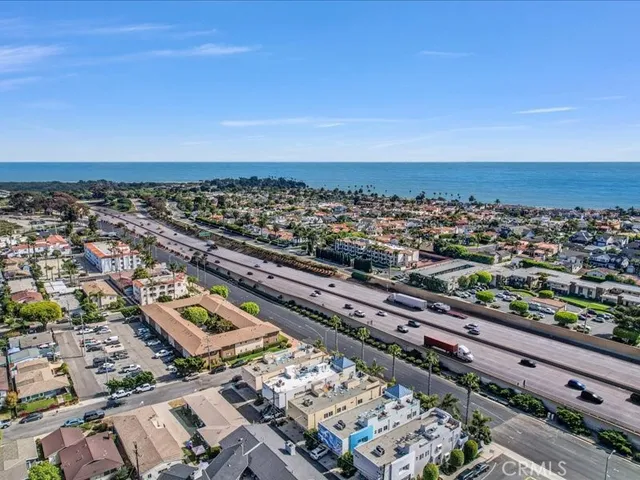 an aerial view of beach and ocean