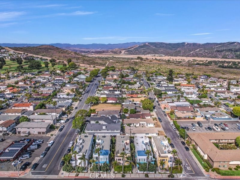 3405 South El Camino Real, Unit A San Clemente, CA 92672 - Photo 50 of 58 an aerial view of residential houses with outdoor space and trees
