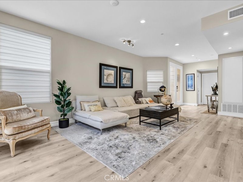 3405 South El Camino Real, Unit A San Clemente, CA 92672 - Photo 7 of 58 a living room with furniture or couch and a potted plant