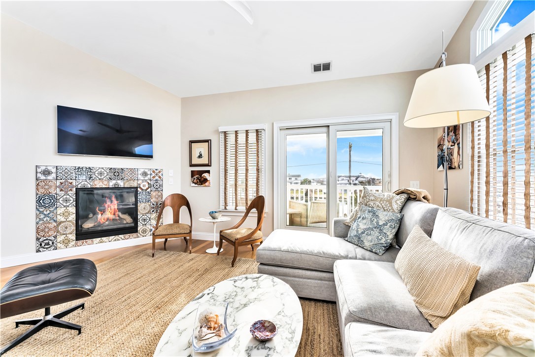 39 Weekapaug Road, Unit 3 Westerly, RI 02891 - Photo 29 of 50 Living Room with Gas Fireplace & Views