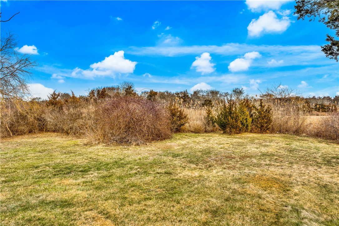 39 Weekapaug Road, Unit 3 Westerly, RI 02891 - Photo 48 of 50 Back Lawn Looking At Conservation Land