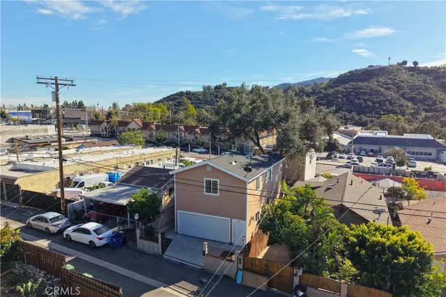 a view of a hallway with dining room and livingroom view