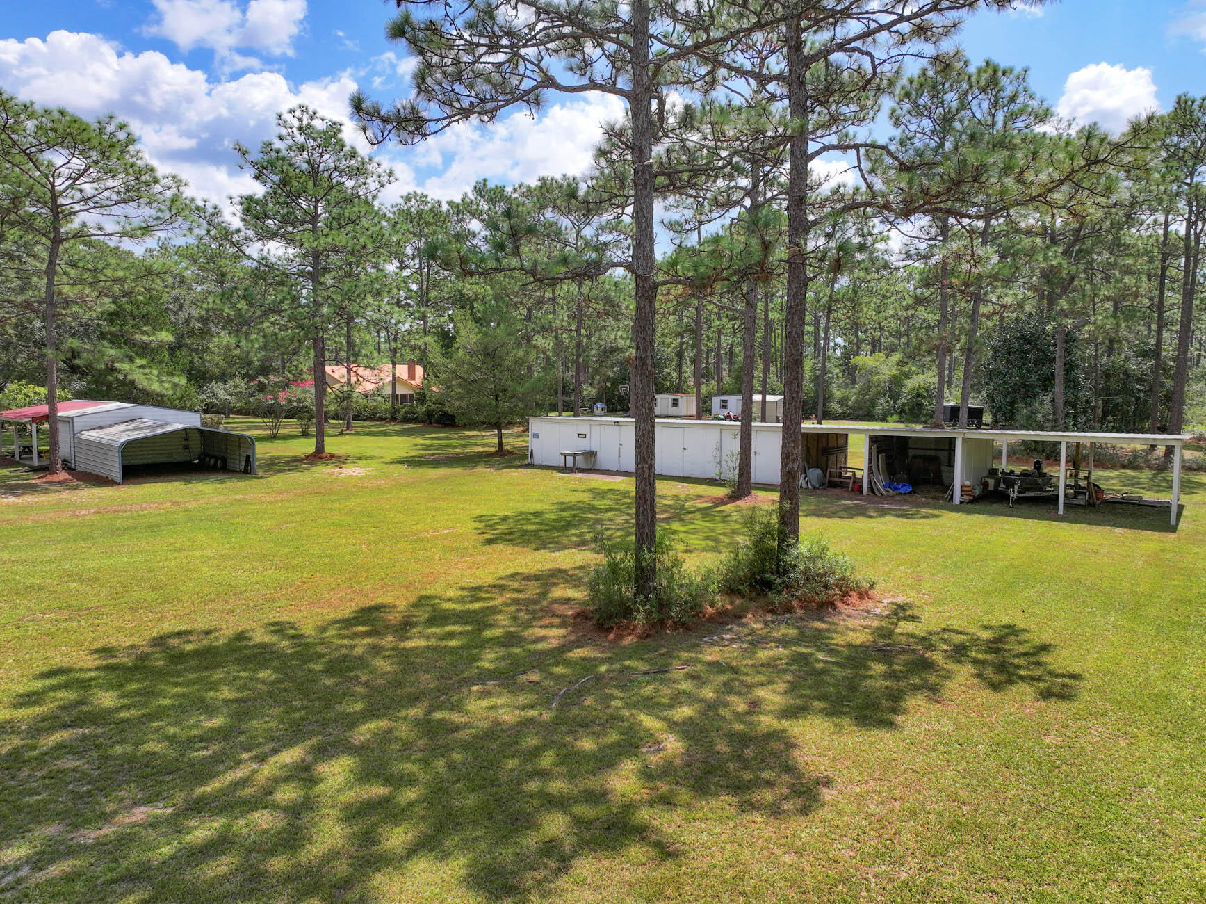 14034 331 Business Freeport, FL 32439 - Photo 19 of 44 a view of a swimming pool with a patio