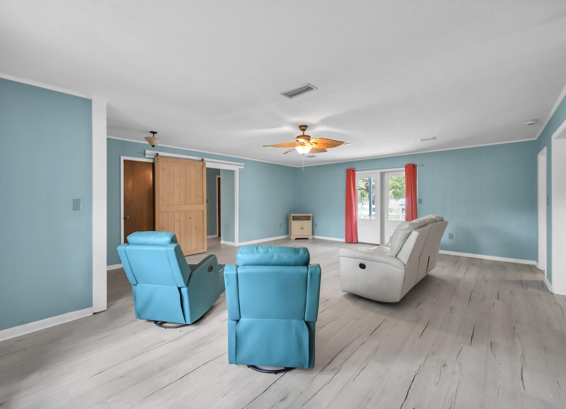 14034 331 Business Freeport, FL 32439 - Photo 30 of 44 a living room with furniture and a window