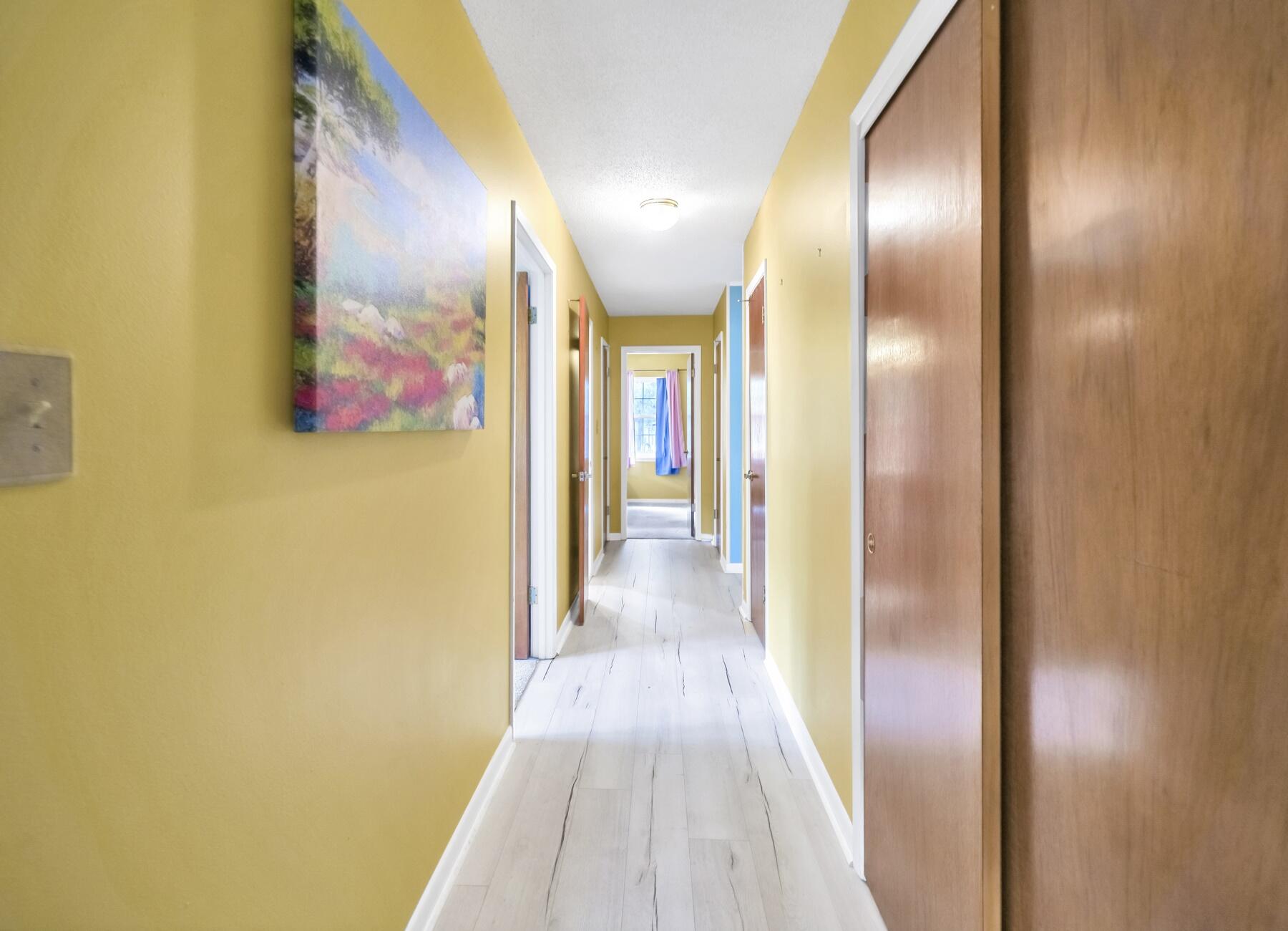 14034 331 Business Freeport, FL 32439 - Photo 40 of 44 a view of a hallway with wooden floor