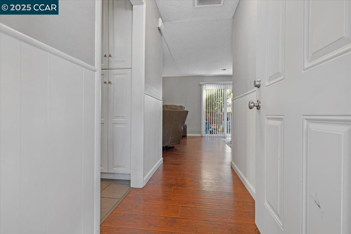 2644 East Olivera Road Concord, CA 94519 - Photo 4 of 42 a view of a hallway with wooden floor