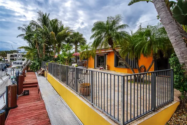 a front view of a house with parking space