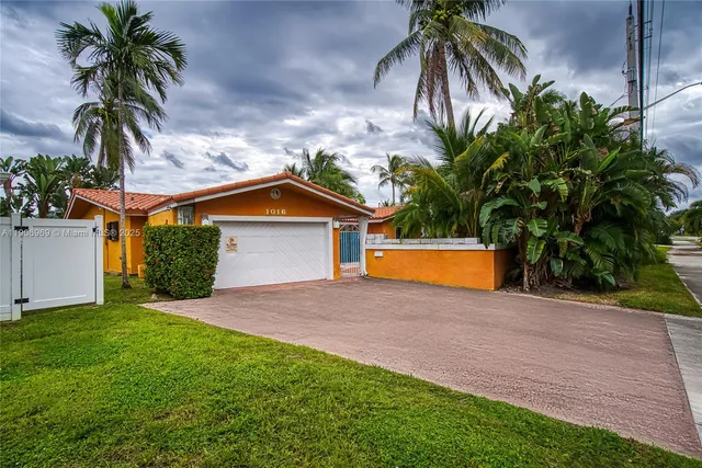 a storage utility room with washer and dryer