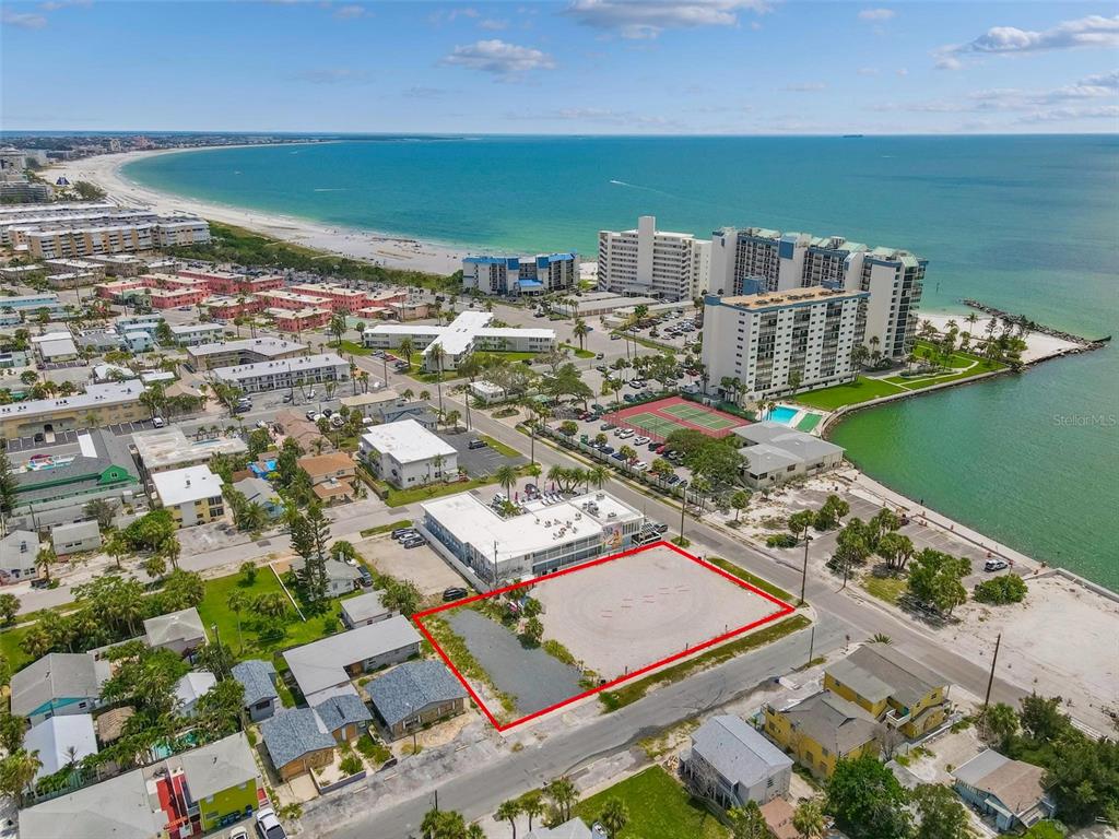7203 Sunset Way St. Petersburg, FL 33706 - Photo 3 of 12 an aerial view of a city with ocean view