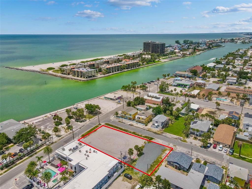 7203 Sunset Way St. Petersburg, FL 33706 - Photo 7 of 12 an aerial view of a house with a garden