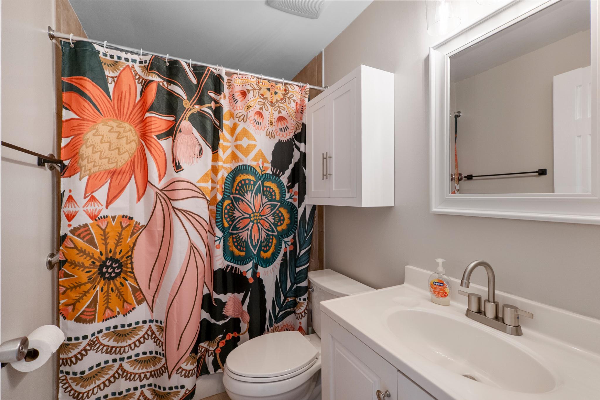 9918 Canvasback Way Damascus, MD 20872 - Photo 20 of 32 a bathroom with a sink toilet and shower