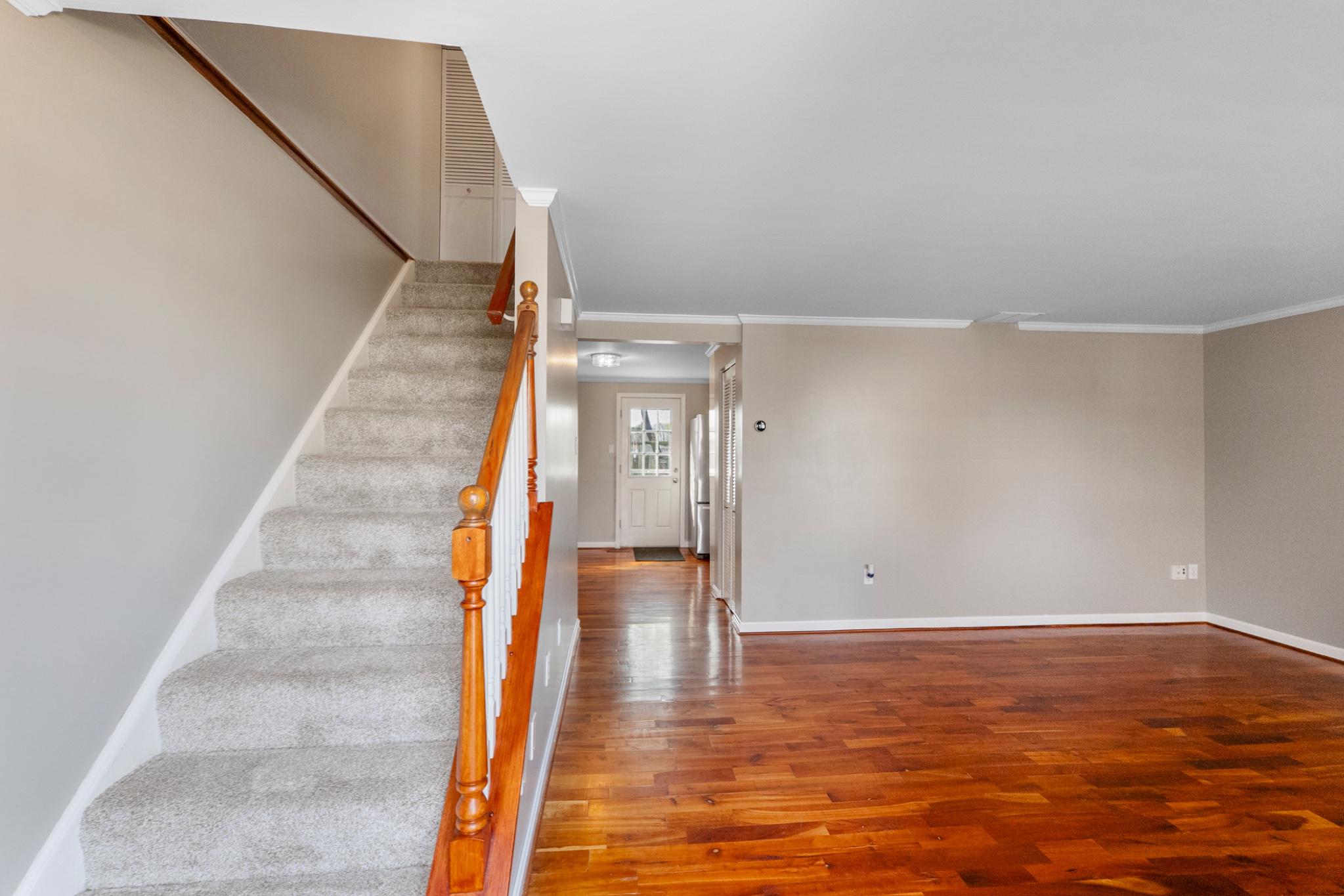 9918 Canvasback Way Damascus, MD 20872 - Photo 2 of 32 a view of an entryway with wooden floor