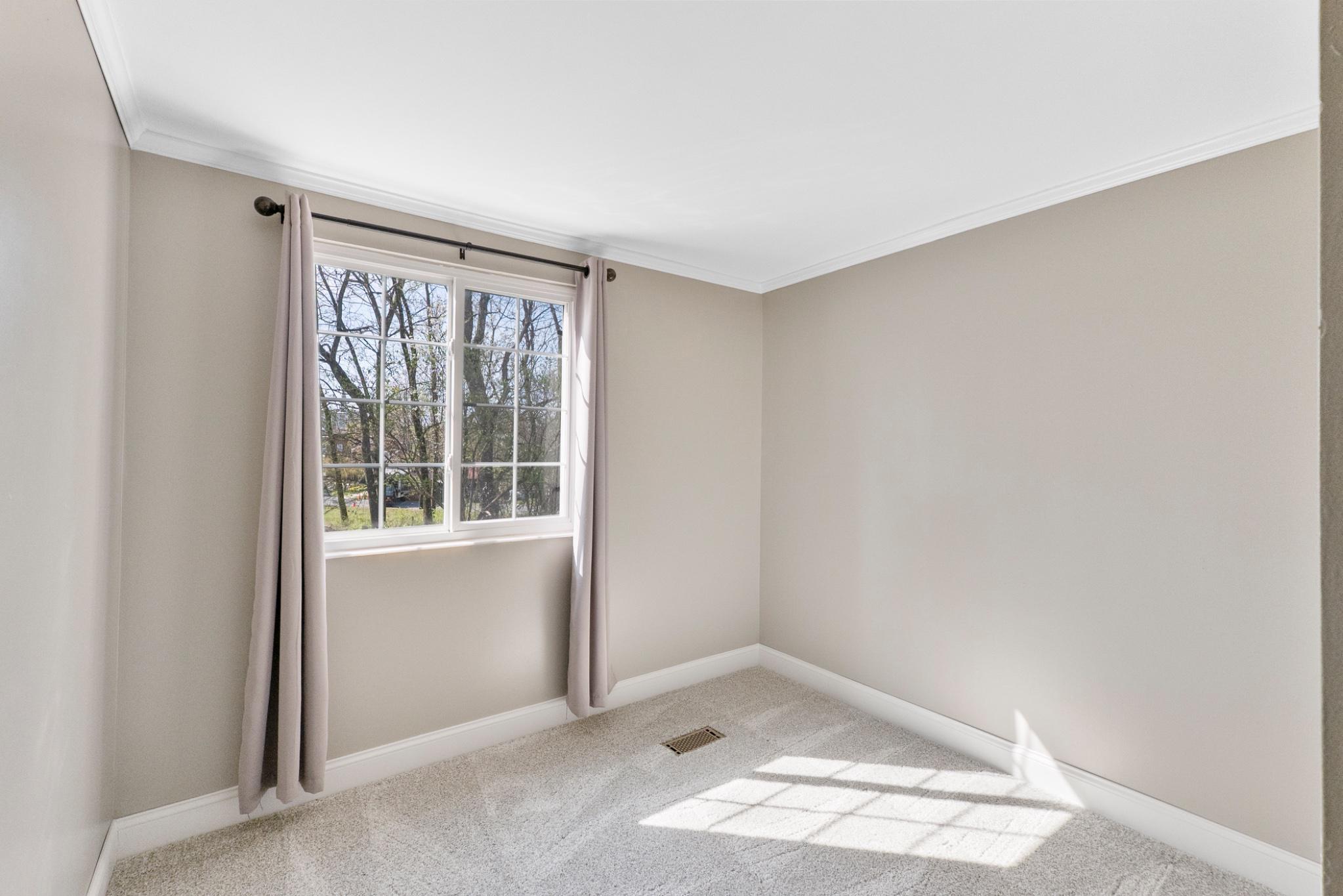 9918 Canvasback Way Damascus, MD 20872 - Photo 23 of 32 a view of an empty room with a window