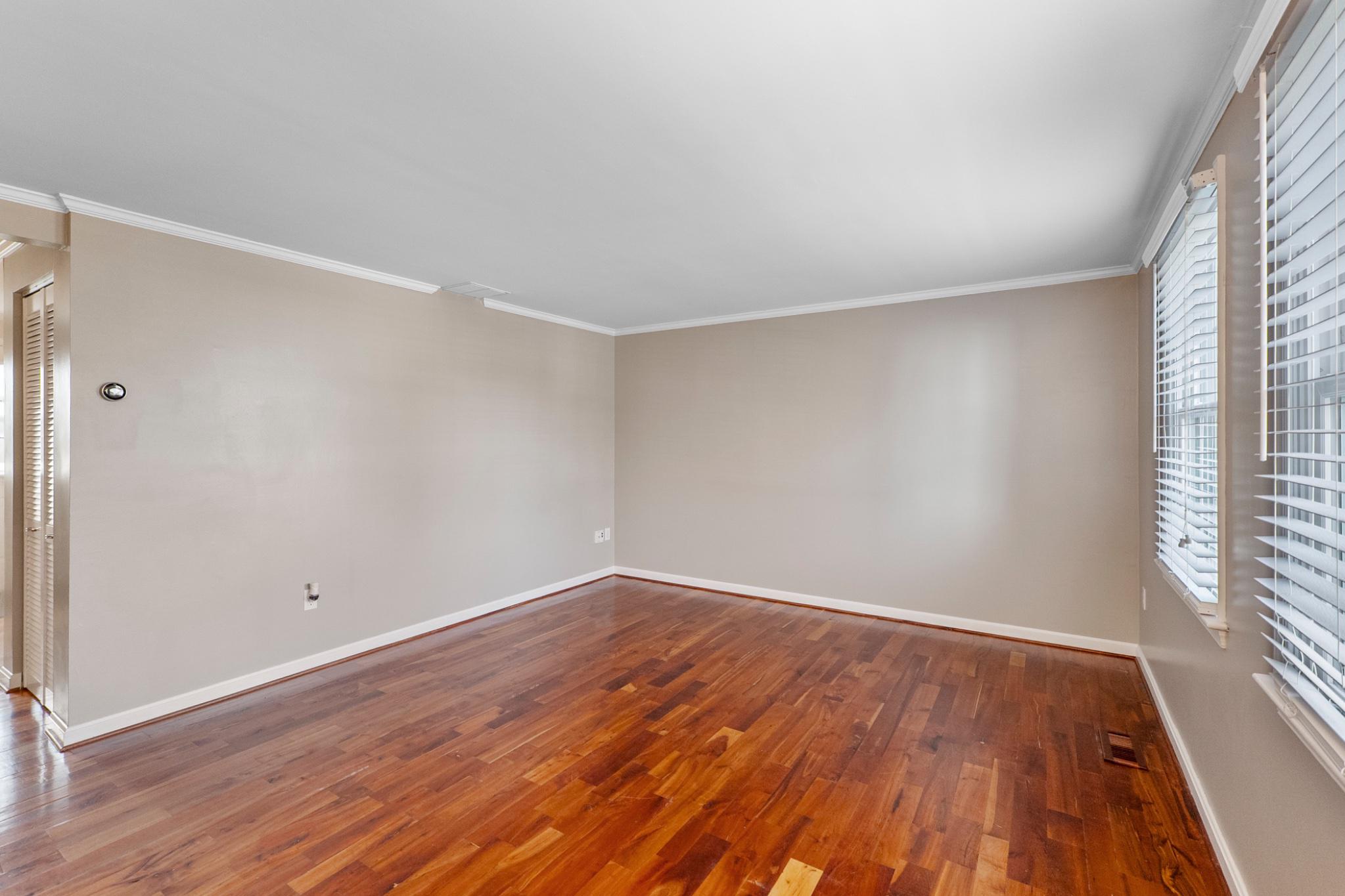 9918 Canvasback Way Damascus, MD 20872 - Photo 6 of 32 wooden floor in an empty room with a window