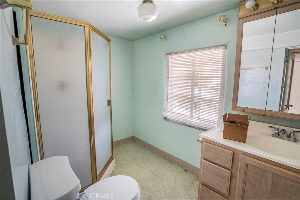 2736 Cuesta Road Santa Barbara, CA 93105 - Photo 16 of 50 a bathroom with a sink toilet and shower