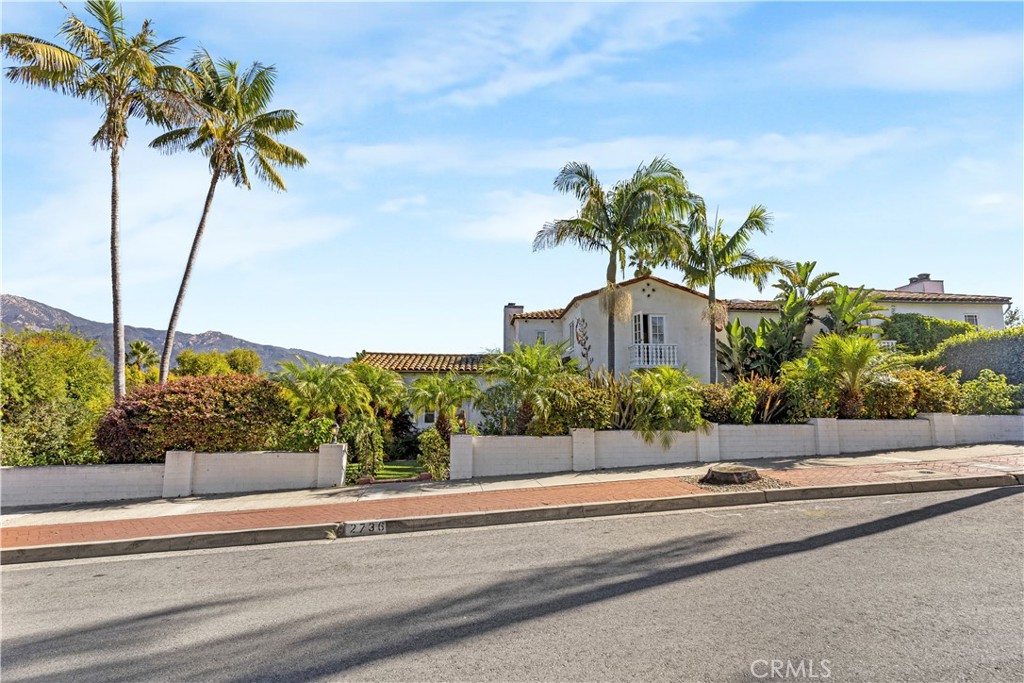 2736 Cuesta Road Santa Barbara, CA 93105 - Photo 2 of 50 a front view of a house with a garden and tree