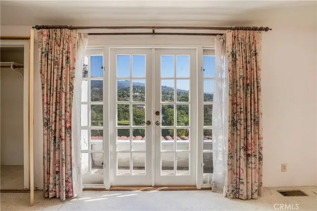 a view of a entryway with a door