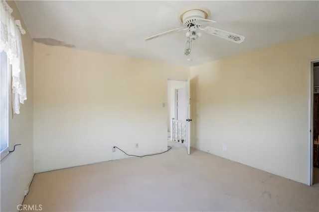 a view of a room with a window