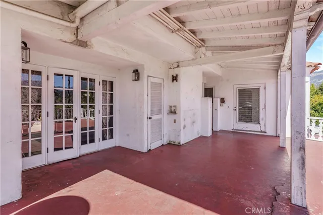 a view of a garden with a house