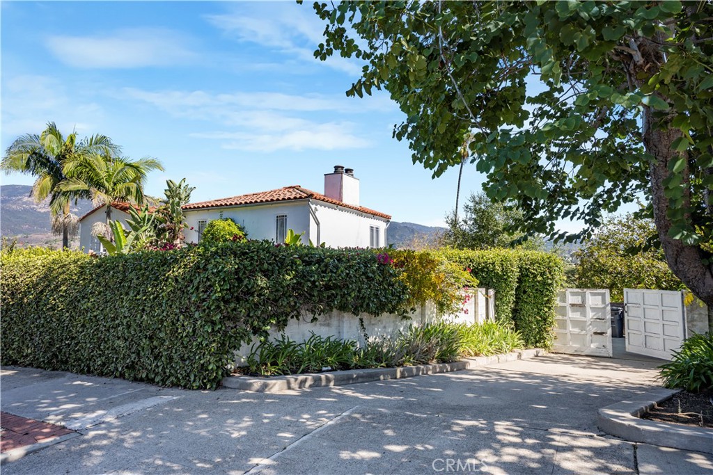 2736 Cuesta Road Santa Barbara, CA 93105 - Photo 50 of 50 a front view of a house with a yard and potted plants