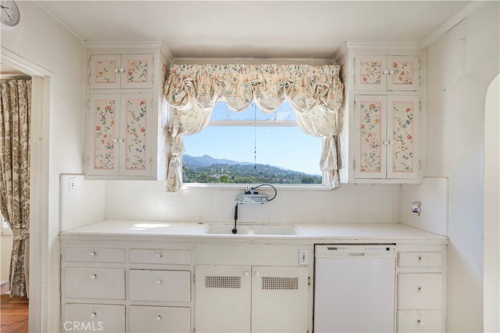 2736 Cuesta Road Santa Barbara, CA 93105 - Photo 7 of 50 a bathroom with a sink and a mirror
