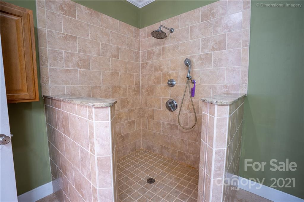 1117 North Ridge Road Hendersonville, NC 28792 - Photo 18 of 35 a bathroom with a shower