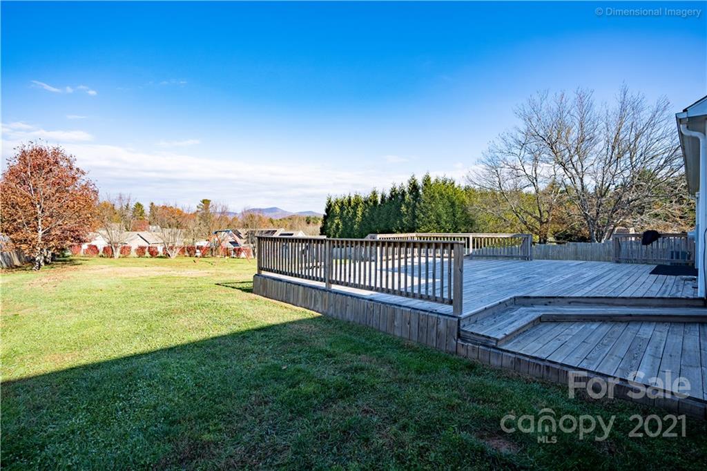 1117 North Ridge Road Hendersonville, NC 28792 - Photo 27 of 35 a view of a pathway with a wrought fence