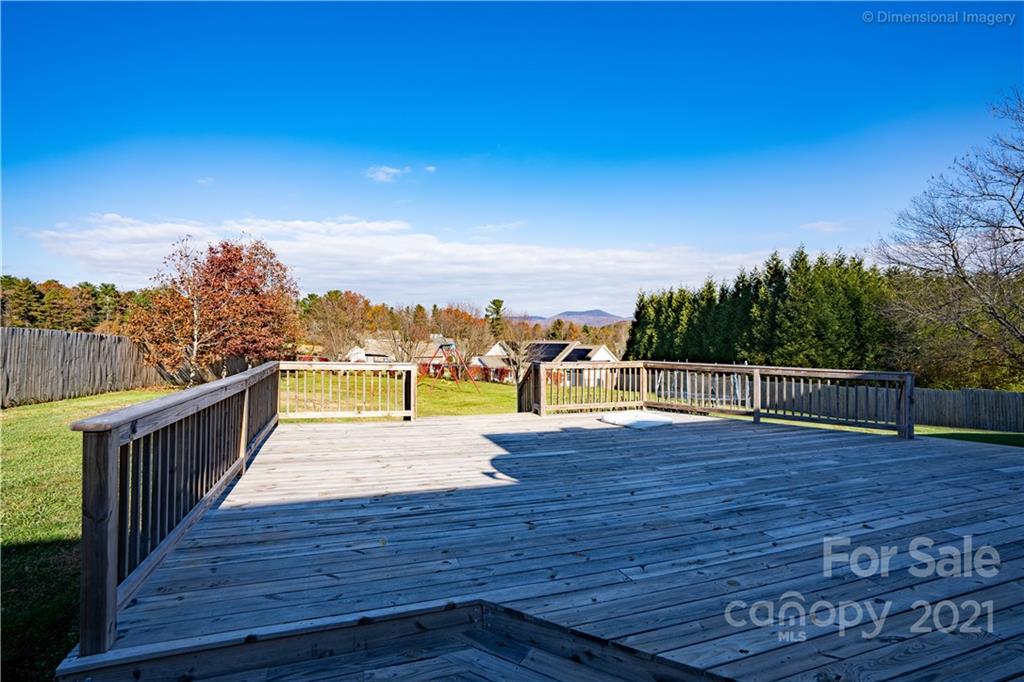 1117 North Ridge Road Hendersonville, NC 28792 - Photo 28 of 35 a view of a balcony with wooden floor