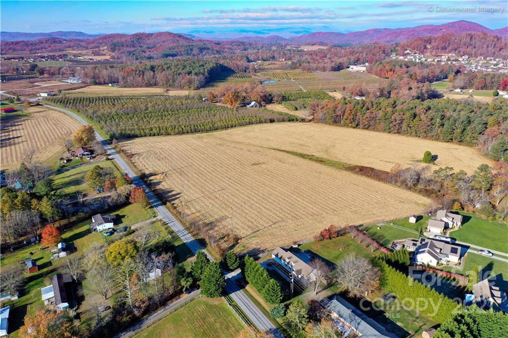 1117 North Ridge Road Hendersonville, NC 28792 - Photo 34 of 35 an aerial view of a house with a mountain