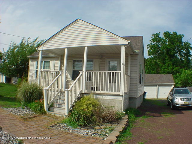356 Drum Point Road Brick, NJ 08723 - Photo 22 of 31 a view of a house with a small yard and plants