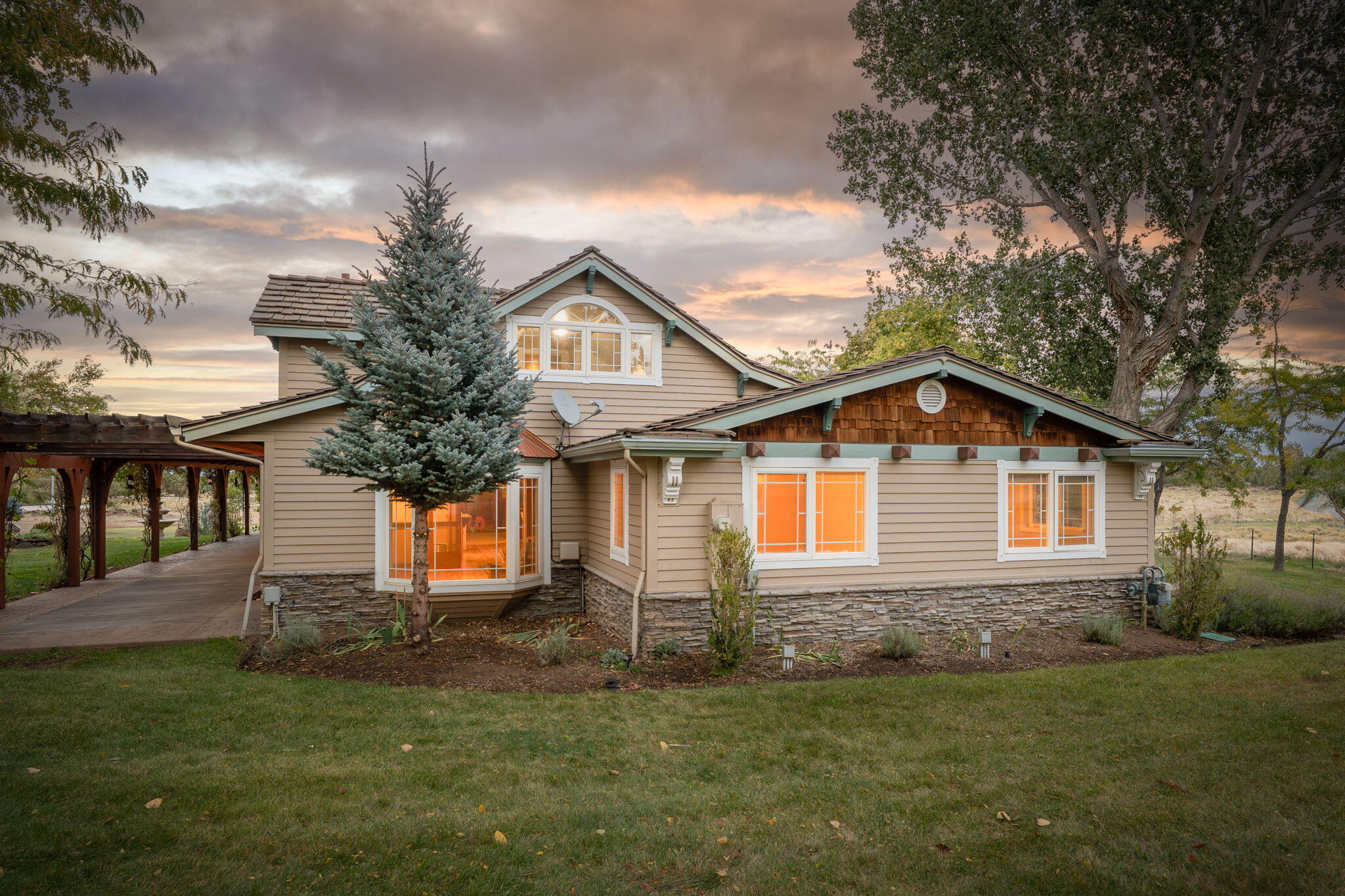 21925 Bear Creek Road Bend, OR 97702 - Photo 80 of 104 West side of the house at sunset