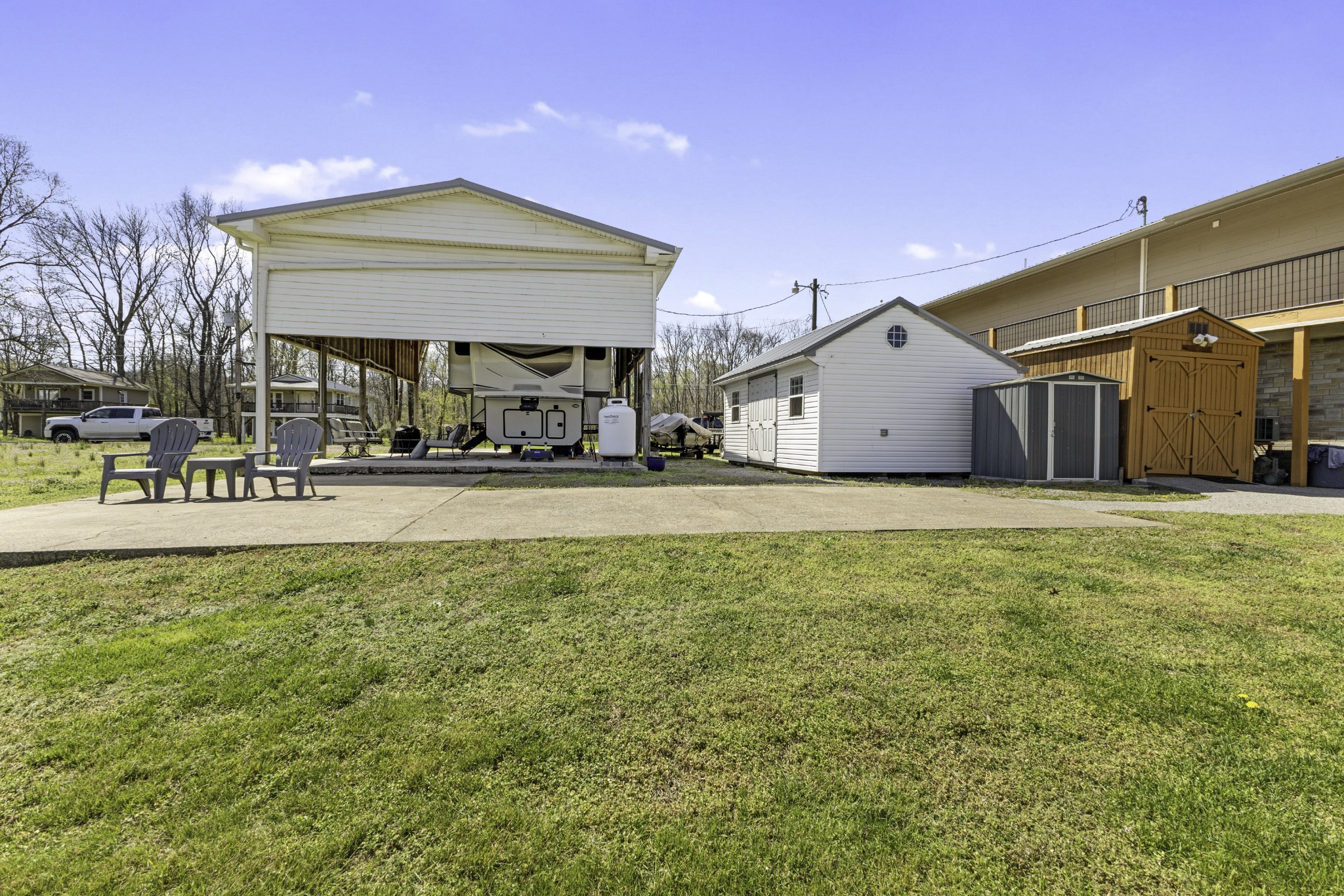 1467 Chapmansboro Road Chapmansboro, TN 37035 - Photo 3 of 13 a front view of a building with a yard