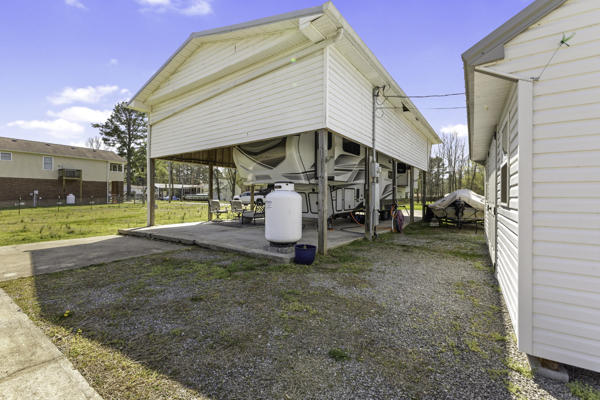 1467 Chapmansboro Road Chapmansboro, TN 37035 - Photo 5 of 13 a view of a house with backyard