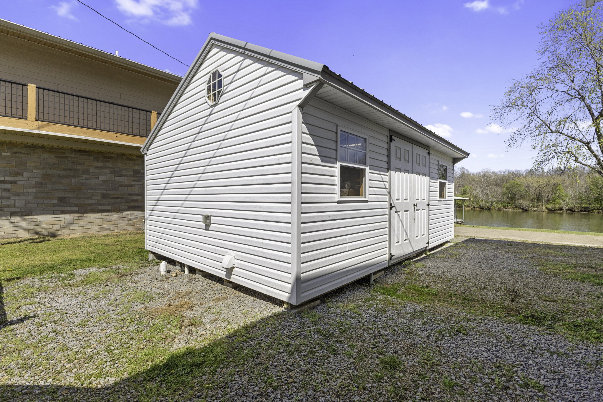 1467 Chapmansboro Road Chapmansboro, TN 37035 - Photo 6 of 13 a view of a small house with a yard