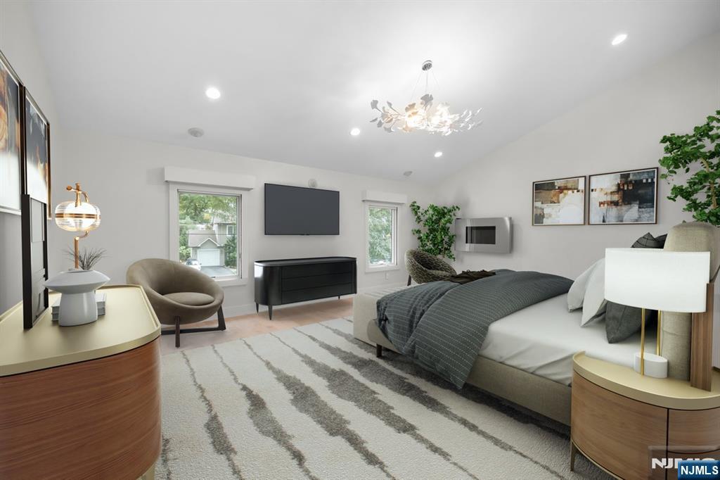 827 Alden Road Paramus, NJ 07652 - Photo 15 of 43 a bedroom with a bed large window and potted plant