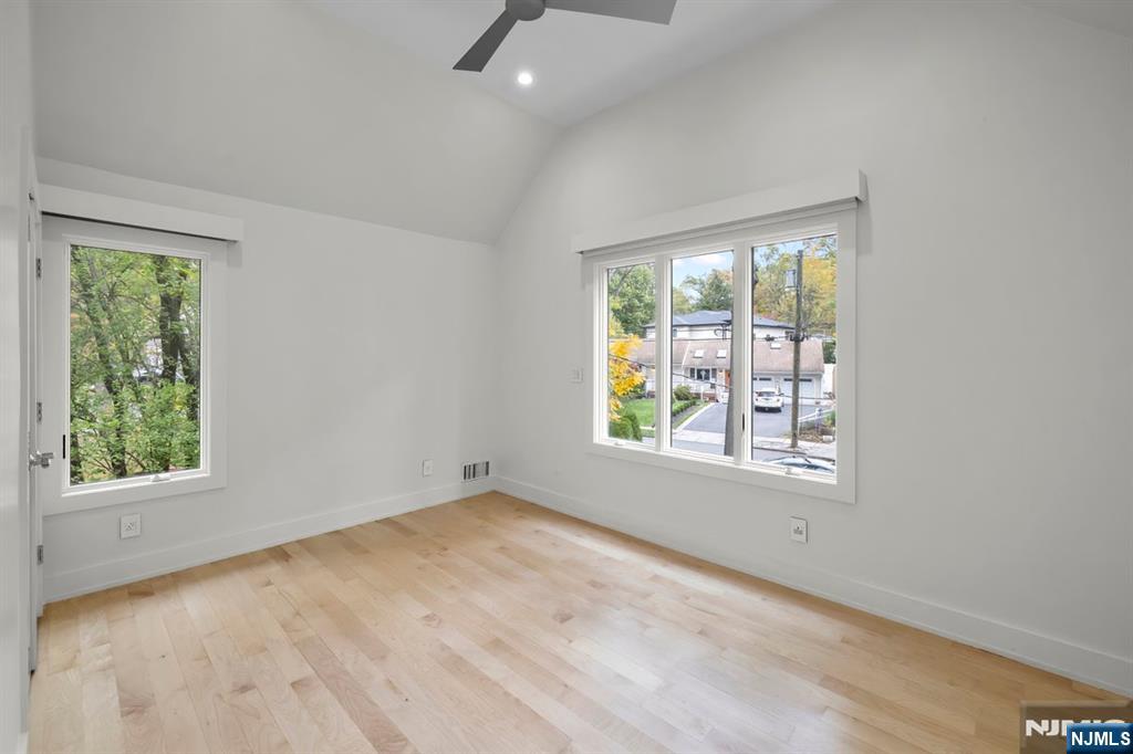 827 Alden Road Paramus, NJ 07652 - Photo 26 of 43 an empty room with windows