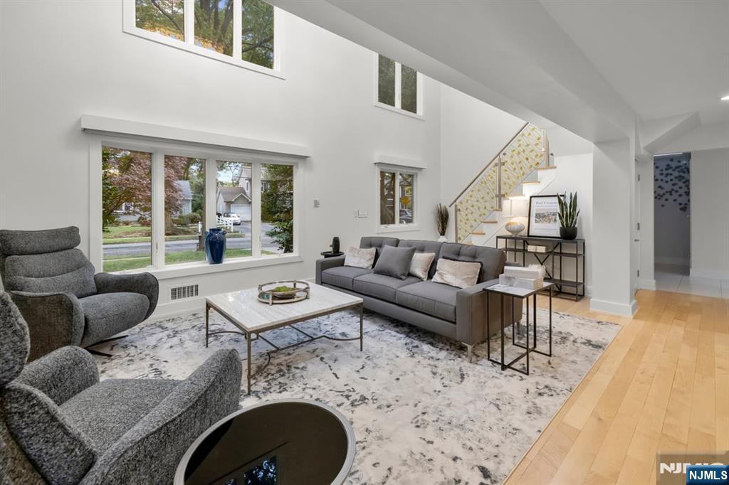 827 Alden Road Paramus, NJ 07652 - Photo 6 of 43 a living room with furniture and a large window