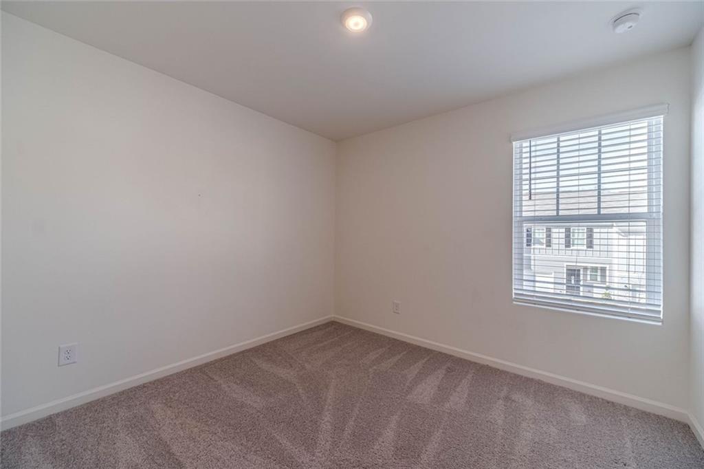 29 Padley Drive Winder, GA 30680 - Photo 11 of 25 an empty room with a window