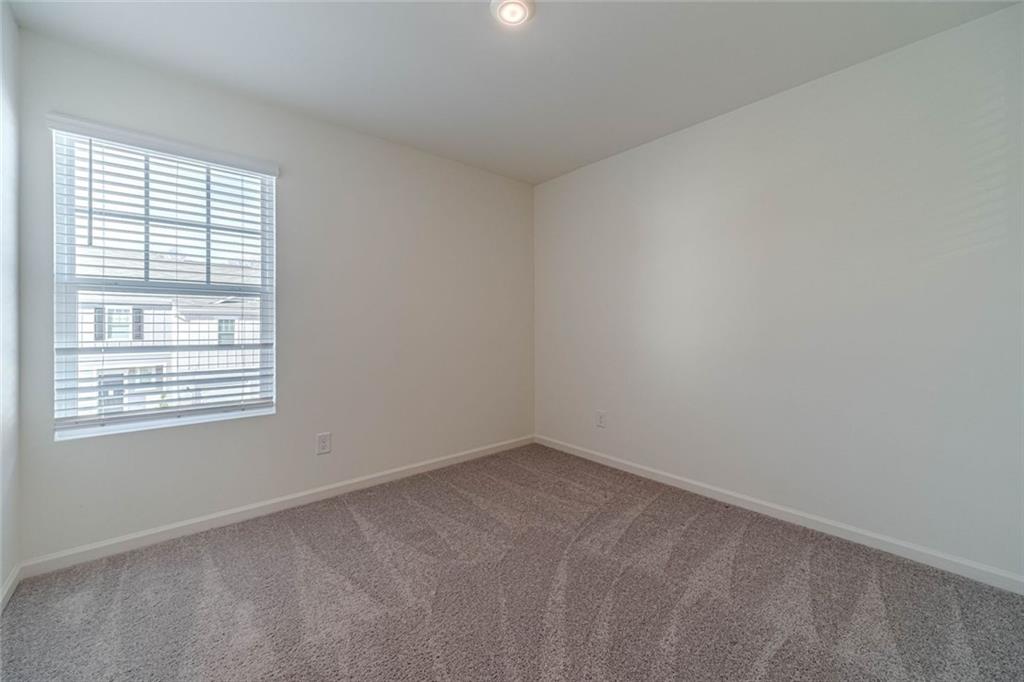 29 Padley Drive Winder, GA 30680 - Photo 15 of 25 an empty room with a window